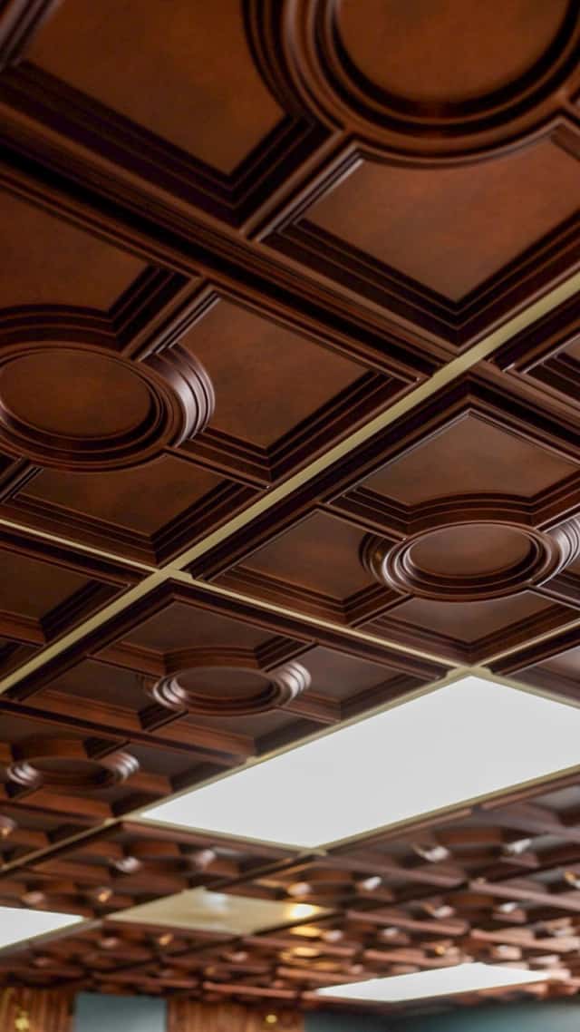 Elegant wood-paneled ceiling design at Cache Cuts premium barbershop Logan Utah