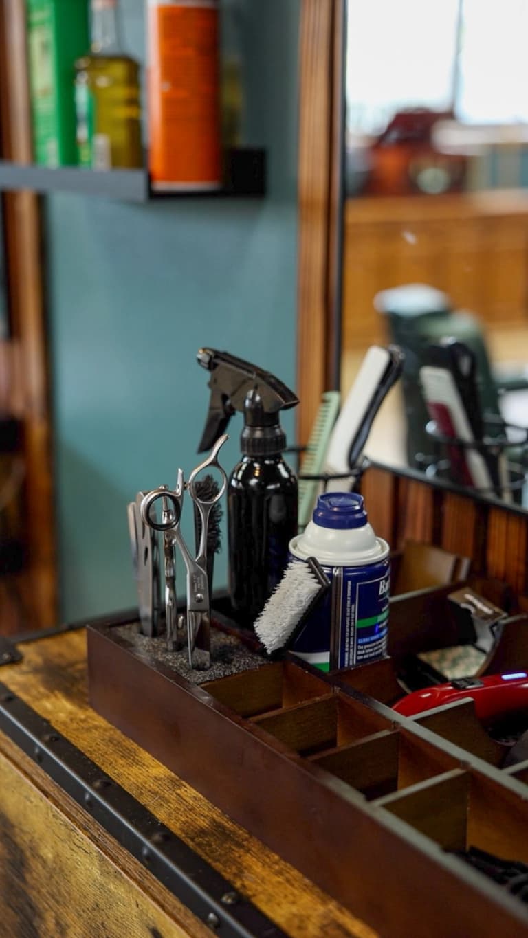 Traditional barbering tools and equipment at Cache Cuts Logan Utah skilled barbers — Professional-grade barbering equipment for precision haircuts and straight-razor shaves